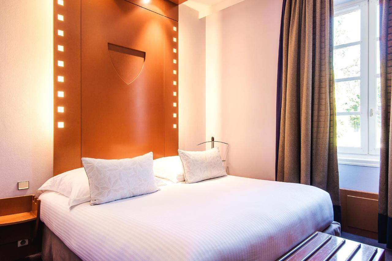 Hotel Au Logis Des Remparts แซงต์เตมีลียง ภายนอก รูปภาพ